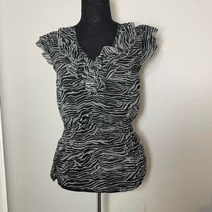 Miley Cyrus black & grey zebra print top with ruffle details and button v neck